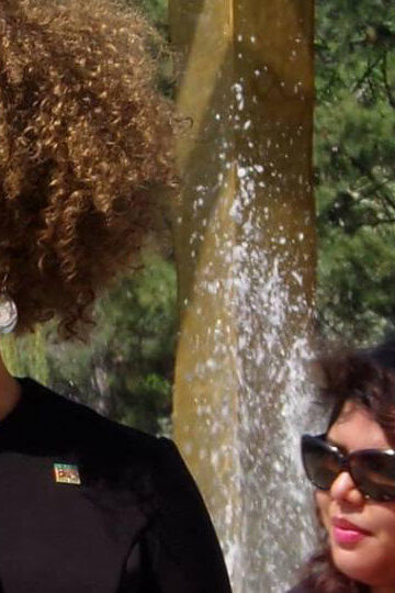 A photo of Rachel Dolezal speaking with a megaphone.