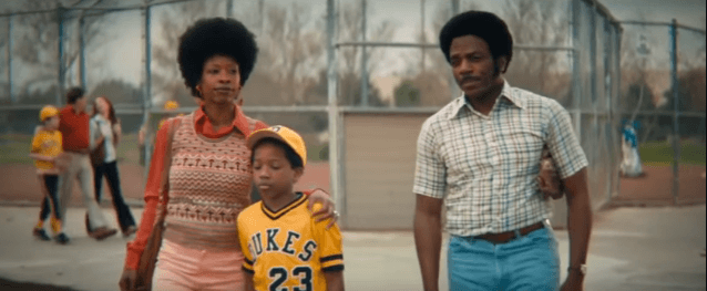 A still from Procter & Gamble's commercial "The Talk," with two Black parents and their kid.