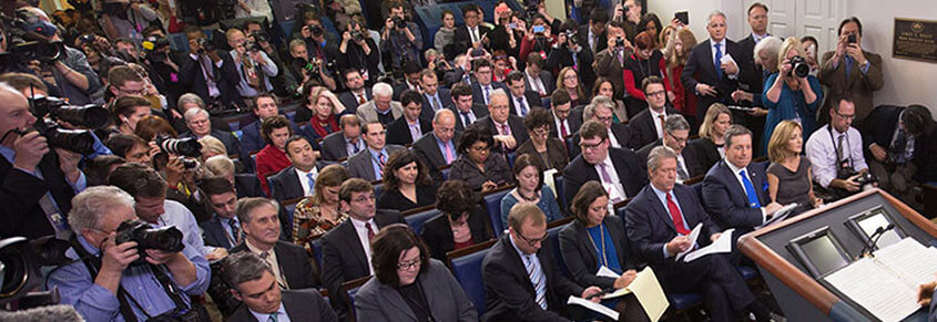 A photo of the White House Press Corps, which is largely white.