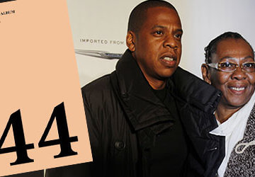 A photo of Jay-Z and his mother with the cover of his album 4:44