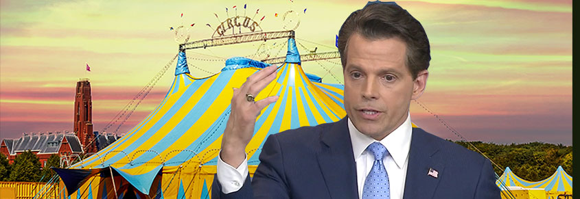 A photo of Anthony Scaramucci with a circus behind him.