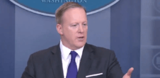 A photo of Sean Spicer speaking to the White House press corps