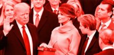 A photo of Donald Trump being sworn in as President with Melania Trump and his children near him.