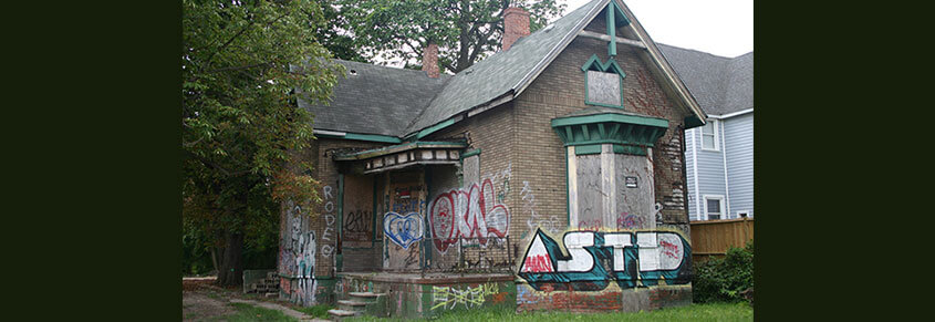 A photo of a house that has been vandalized