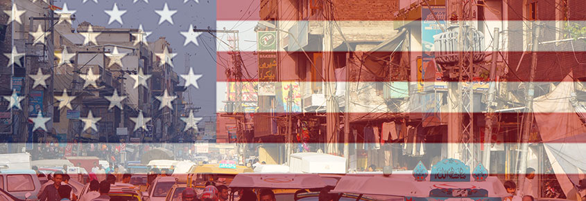 A collage of the US flag in the background and a photo of slums in the background.