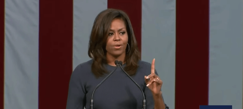 Michelle Obama speaking on a stage