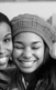 A photo of a Black woman and a Black teenager