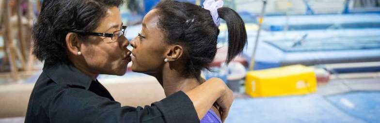 A photo of Simone Biles and her mother