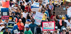 A photo from a protest support DACA. Posters have messages like "United and Strong," "Stay Strong Dreamers. You Are Loved And Wanted," and "Los Angeles Stands With Dreamers."