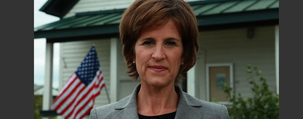 A photo of Rebecca Otto outside of her home.