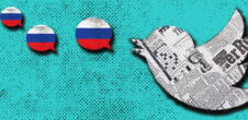A collage of a Twitter bird covered is a newspaper and speech bubbles painted the color of the Russian flag.