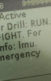 A message on a machine that says, "Drill – Active. Shooter Drill: Run. Hide. Fight. For more info: Imu.edu/emergency