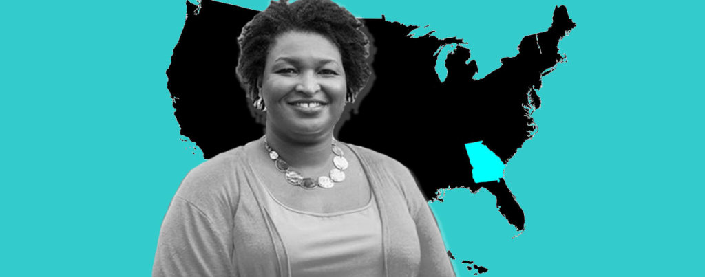 A collage of Stacy Abrams in front of a map of the United States. The US is black except for the state of Georgia, which is blue.