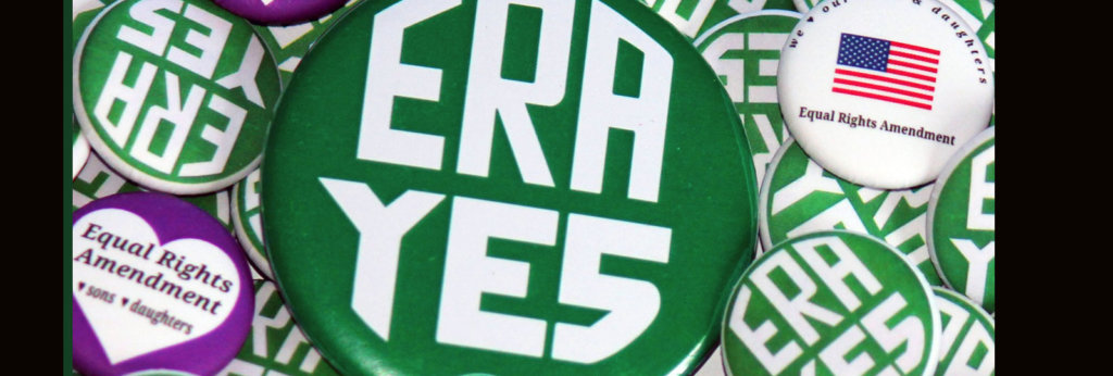 A photo of buttons that say "Era Yes" on them.
