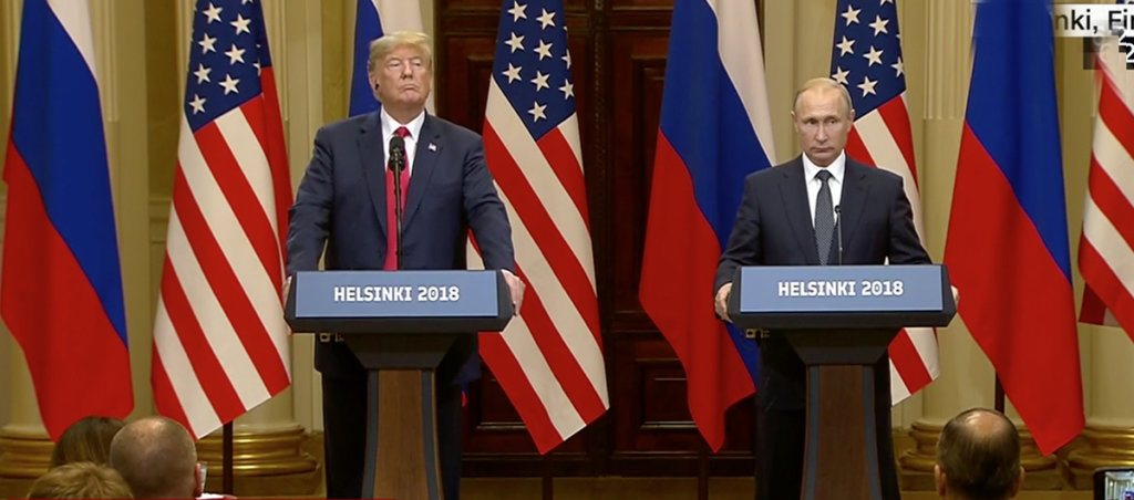 A photo of Donald Trump and Vladimir Putin speaking at a press conference together.