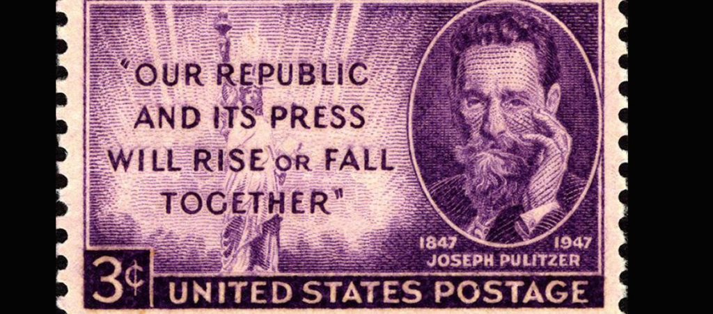 A stamp that says "Our Republic and Its Press Will Rise or Fall Together" with a photo of Joseph Pulitzer