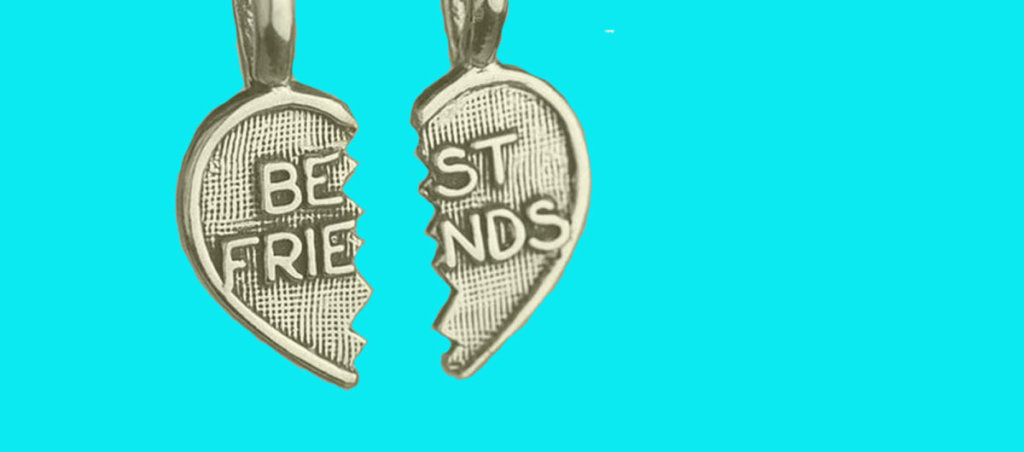 A necklace that says "Best Friends" that is ripped in half.