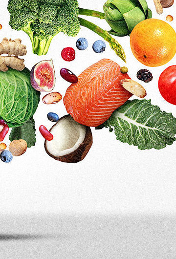 An image of vegetables, fruit and salmon flying out of a pill.