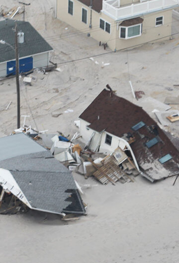 A photo of a row of houses that are destroyed