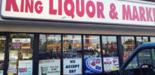 A photo of the front of "King Liquor & Market" store