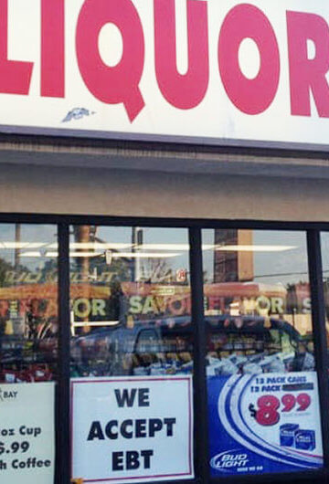 A photo of the front of "King Liquor & Market" store
