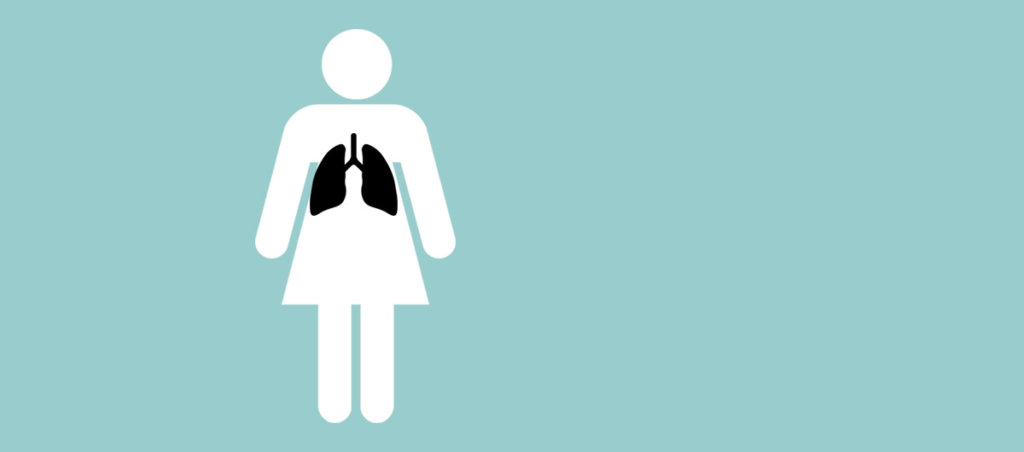 An illustration of a women that is white, and her lungs which are black are visible.