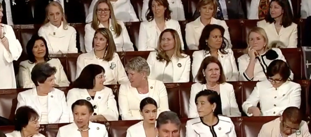 A photos of women wearing white at Trump's SOTU.