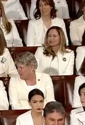 A photos of women wearing white at Trump's SOTU.