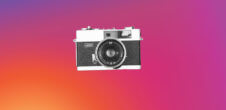 A collage of a camera on top of a background that has Instagram's colors.
