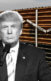 A collage of a photo of Donald Trump in front of a wall with signs on it that say, "No Identificado"