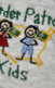 A photo of a shirt that says "Border Patrol Kids" on it.
