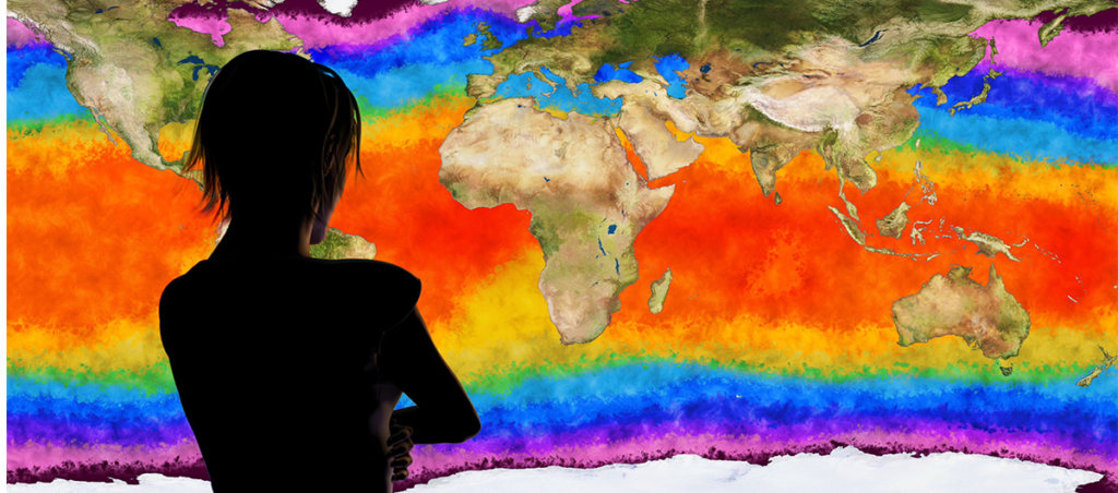 A woman standing in front of a map of the world which is showing the visualization of different temperatures.