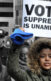 Photos of a protest of largely black people. Someone is holding a sign that says, "Voter suppression is unAmerican."