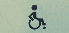 An icon of a person in a wheelchair