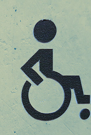 An icon of a person in a wheelchair