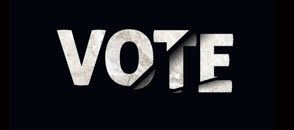 The word "Vote." The letters o, t, and e are slightly ripped up.