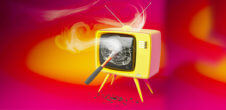 Image of a television smashed with a hammer breaking screen