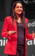 A photo of Nandini Jammi speaking onstage.