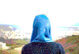 woman in hijab looking out at mountains