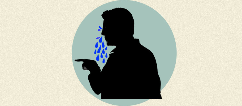 An illustration of a black silhouette of someone crying.