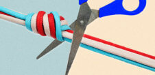 Someone cutting a rope of red, white and blue strings with scissors