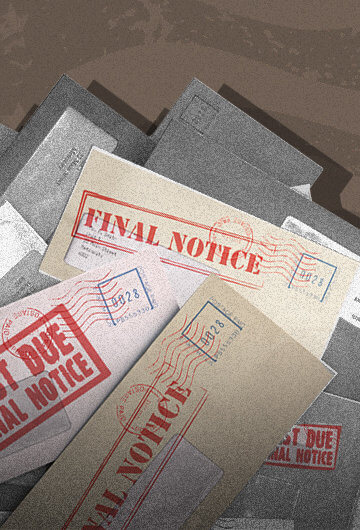 A pile of bills with stamps saying past due