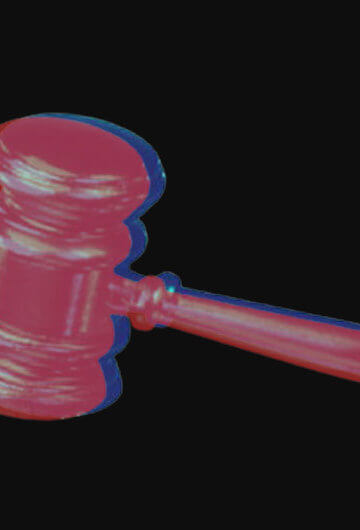 Judge's gavel on a black background