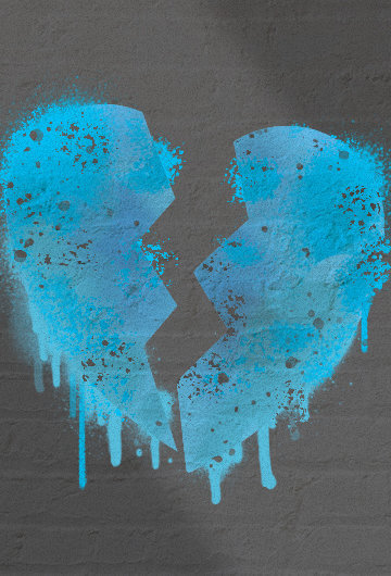 a broken heart, in the color blue, spray painted on a grey brick wall