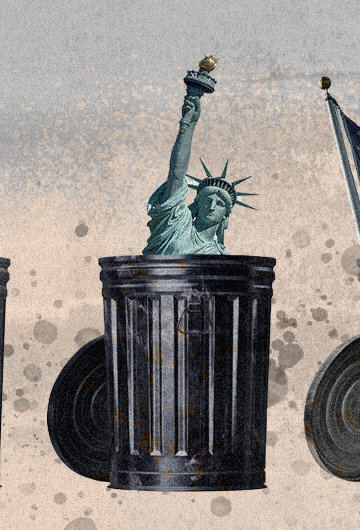 three garbage cans, one has the constitution in it, one has the statue of liberty and one has the american flag sticking out of it.