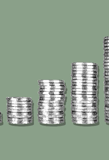 stacks of ascending coins on a green background