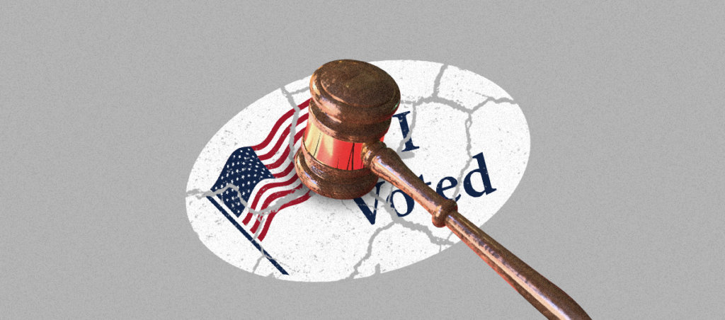 A I Voted Sticker with cracks in it, and a judges gavel smashing it