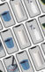 A collage of phones with sponges, mops, paper toilettes and buckets on them.