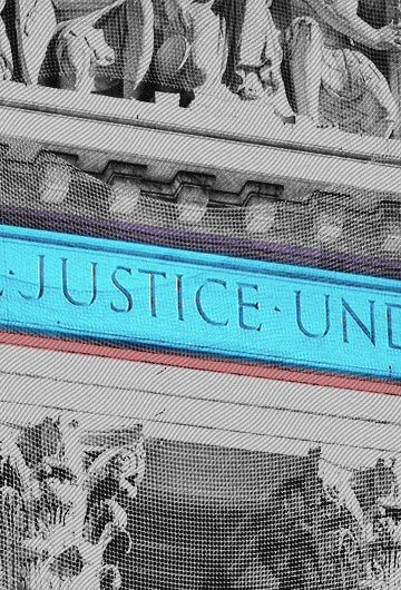 The top of the U.S. Supreme Court building with "Equal Justice Under Law" highlighted in blue.