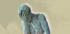 A green statue of a man looking down with his hand on his face.